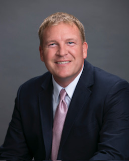 Headshot image of Author Roger Edwards